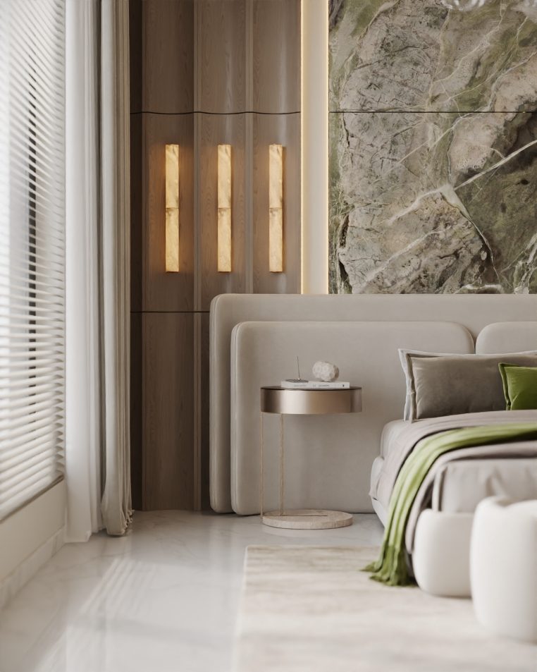 Bedroom detail with a bedside lamp and a textured bed