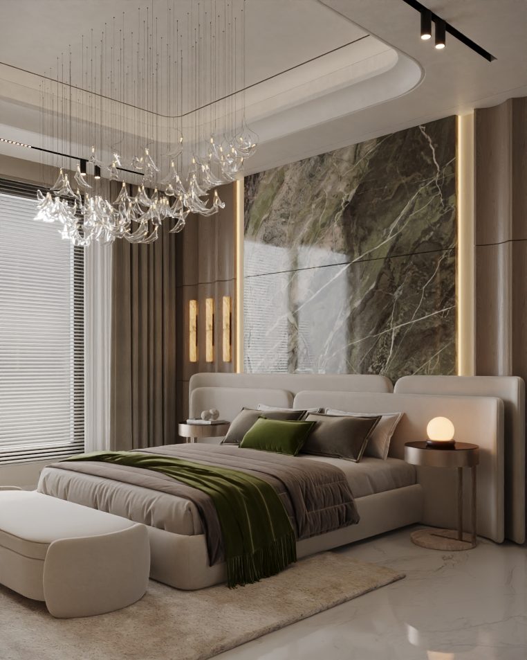 Bedroom with a marble wall, pendant chandelier and a cream rug