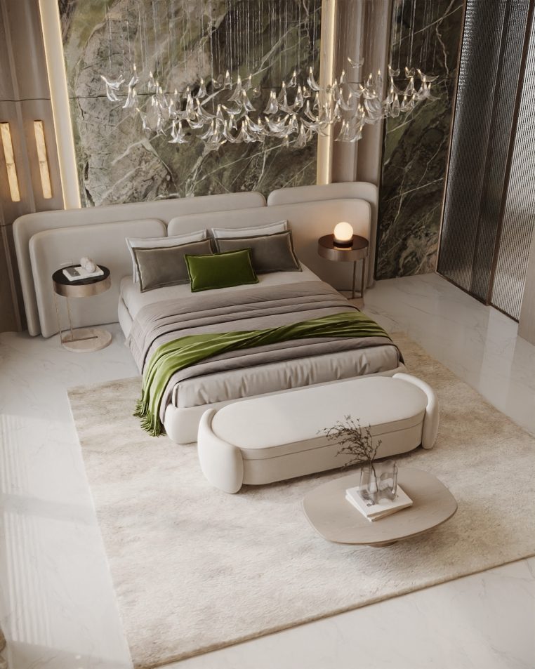 Bedroom with a bed, green throw and an arched window