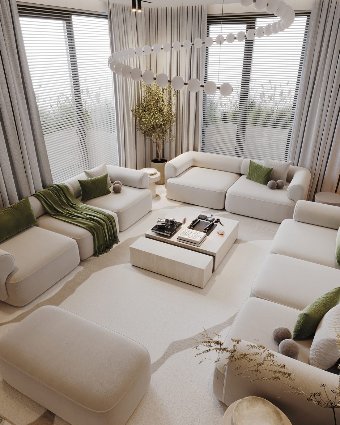 Lounge with a long cream sofa and a green throw